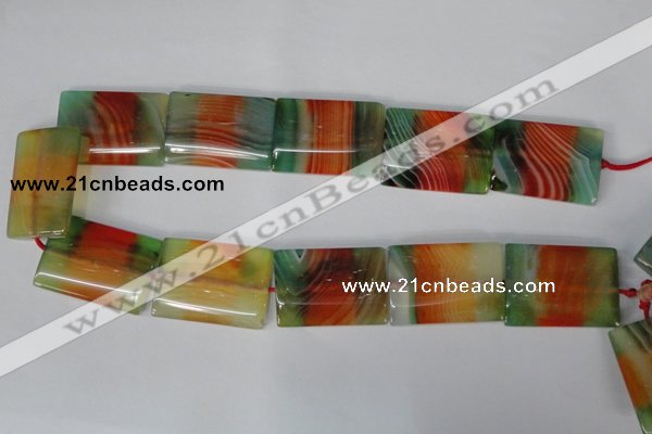 CAG1057 15.5 inches 25*35mm flat tube rainbow agate beads
