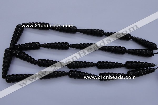 CAG1697 15.5 inches 10*35mm carved teardrop black agate beads