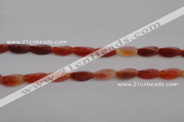 CAG4201 7*14mm faceted & twisted trihedron natural fire agate beads