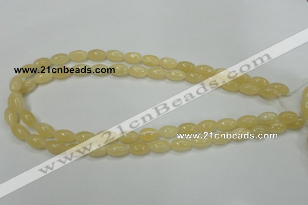 CCA208 15.5 inches 8*12mm rice yellow lace calcite beads