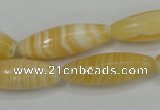 CCA209 15.5 inches 10*30mm rice yellow lace calcite beads
