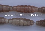 CFG755 15.5 inches 10*30mm carved rice natural moonstone beads
