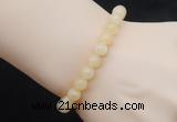 CGB5012 6mm, 8mm round honey jade beads stretchy bracelets