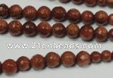 CRO736 15.5 inches 6mm – 14mm faceted round goldstone beads