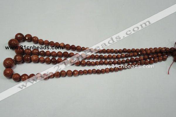 CRO736 15.5 inches 6mm – 14mm faceted round goldstone beads