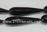 CTU1493 15.5 inches 10*40mm faceted teardrop synthetic turquoise beads