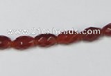 CAA124 15.5 inches 6*10mm faceted rice red agate gemstone beads