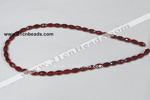 CAA124 15.5 inches 6*10mm faceted rice red agate gemstone beads