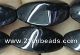 CAA2484 15.5 inches 10*20mm twisted rice black agate beads