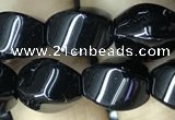 CAA2485 15.5 inches 8*12mm twisted rice black agate beads