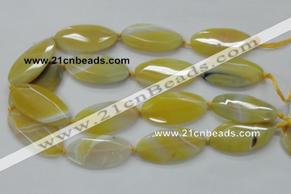 CAA325 15.5 inches 25*50mm faceted marquise yellow line agate beads