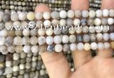 CAA3587 15.5 inches 6mm round matte ocean fossil agate beads