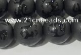 CAA3676 15.5 inches 8mm round matte & carved black agate beads