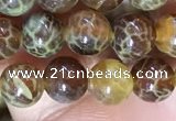 CAA5036 15.5 inches 4mm round yellow dragon veins agate beads