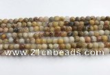 CAA5290 15.5 inches 4mm faceted round crazy lace agate beads wholesale