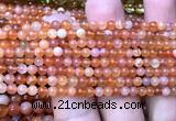 CAA6150 15 inches 4mm round orange Botswana agate beads