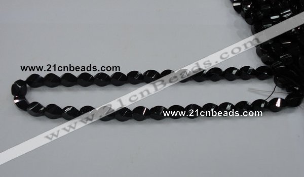 CAB335 15.5 inches 8*12mm faceted & twisted rice black agate beads