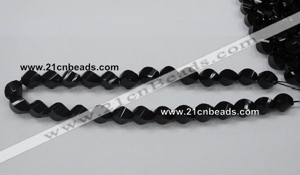 CAB336 15.5 inches 10*14mm faceted & twisted rice black agate beads