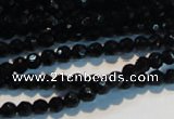 CAB782 15.5 inches 4mm faceted round black agate gemstone beads