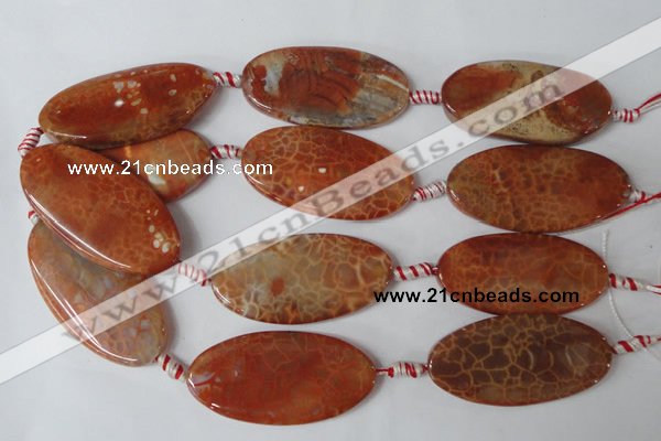CAG1592 15.5 inches 25*50mm twisted oval fire crackle agate beads