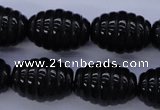 CAG1693 15.5 inches 15*20mm carved rice black agate beads
