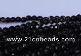 CAG2312 15.5 inches 4mm faceted round black line agate beads