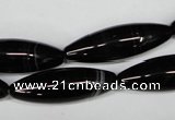 CAG2969 15.5 inches 10*30mm rice black line agate beads