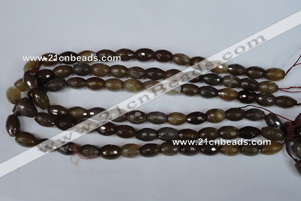 CAG3129 15.5 inches 10*14mm faceted rice brown line agate beads