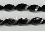 CAG4009 15.5 inches 8*16mm faceted & twisted rice black agate beads