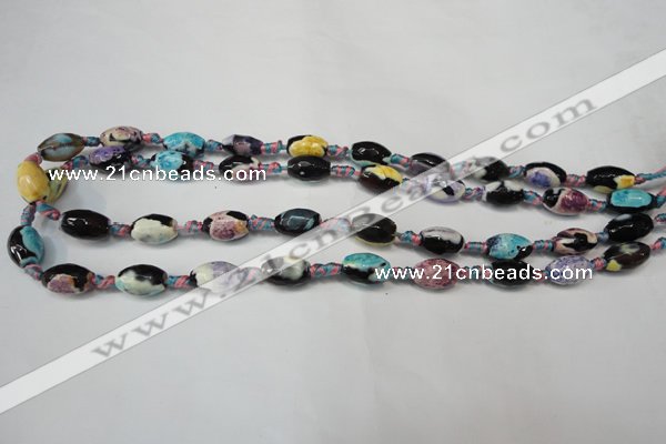 CAG5772 15 inches 8*12mm faceted rice fire crackle agate beads