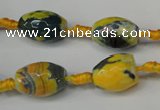 CAG5774 15 inches 10*14mm faceted rice fire crackle agate beads