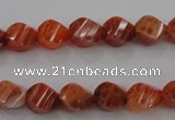 CAG580 15.5 inches 8*10mm faceted & twisted rice natural fire agate beads