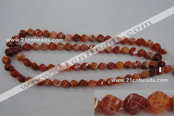 CAG580 15.5 inches 8*10mm faceted & twisted rice natural fire agate beads