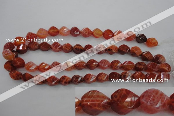 CAG582 15.5 inches 10*14mm faceted & twisted rice natural fire agate beads