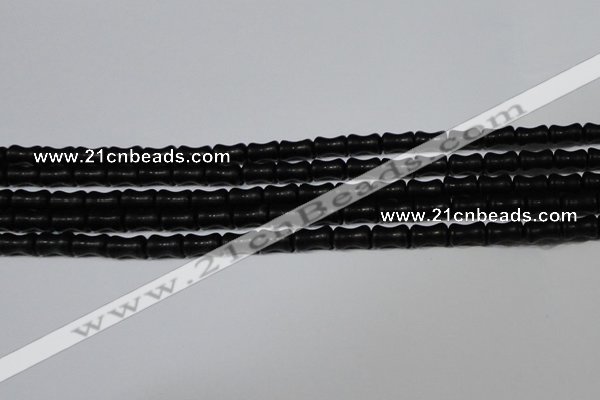 CAG6038 15.5 inches 4*8mm bone matte black agate beads