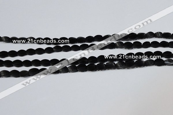 CAG6040 15.5 inches 5*8mm twisted rice matte black agate beads