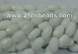 CAG720 15.5 inches 6*8mm faceted rice white agate gemstone beads