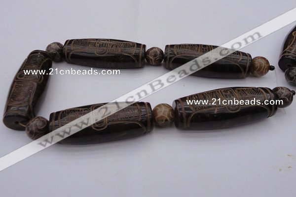 CAL04 14.5 inches 25*60mm carved drum agalmatolite beads