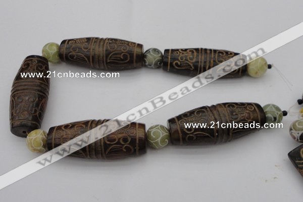 CAL05 14.5 inches 25*60mm carved drum agalmatolite beads