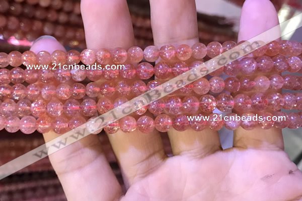 CBQ558 15.5 inches 4mm round golden strawberry quartz beads