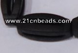 CBS28 15.5 inches 15*35mm carved flat drum black stone beads