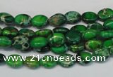 CDE178 15.5 inches 6*8mm oval dyed sea sediment jasper beads