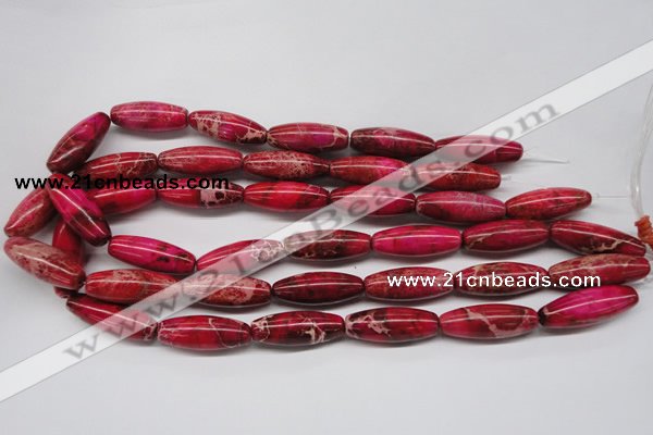 CDI607 15.5 inches 11*31mm rice dyed imperial jasper beads