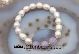 CFB902 9mm - 10mm rice white freshwater pearl & lavender amethyst stretchy bracelet