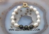 CFB958 Hand-knotted 9mm - 10mm rice white freshwater pearl & golden obsidian bracelet