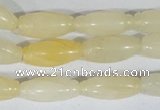 CFG552 15.5 inches 8*20mm carved rice yellow aventurine beads