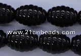 CFG759 15.5 inches 15*20mm carved rice black agate beads