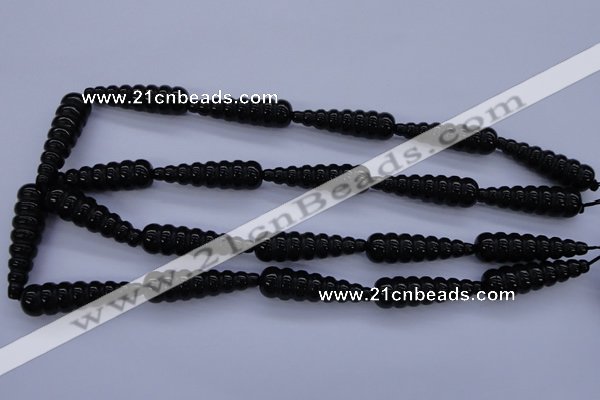 CFG761 15.5 inches 10*35mm carved teardrop black agate beads