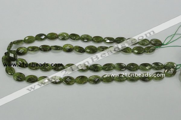 CGA107 15.5 inches 10*14mm faceted oval natural green garnet beads