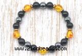 CGB8411 8mm synthetic amber, black onyx & hematite energy bracelet